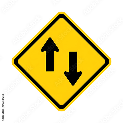 Yellow diamond road sign with two black arrows, one pointing up and one pointing down, indicating two-way traffic.