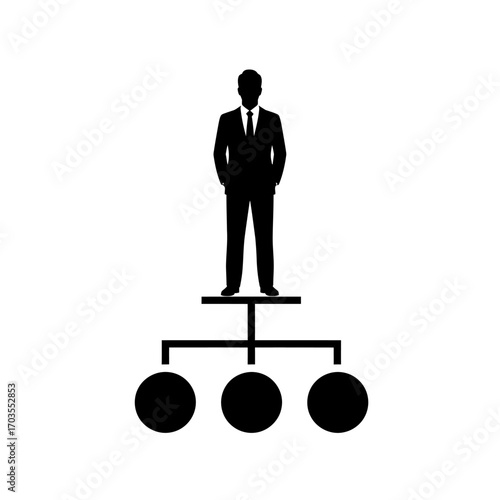 Silhouette of a businessman standing above a hierarchical structure