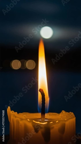 Warm candlelight glow against a dark blue background with bokeh lights and a soft moon in the distance creates a peaceful ambiance