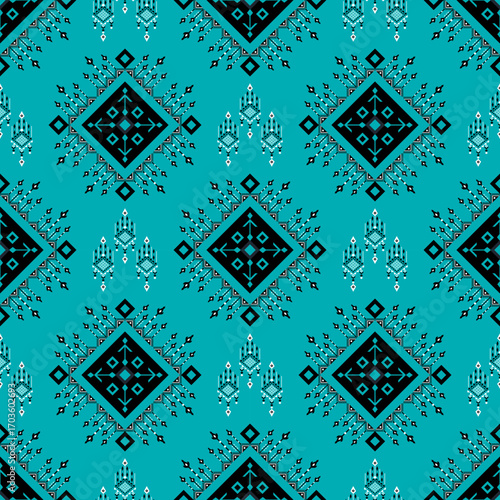  A seamless vector pattern with a modern tribal and ethnic feel. The intricate geometric motifs are arranged in a repeating design, featuring a striking color palette of turquoise, black, and white.