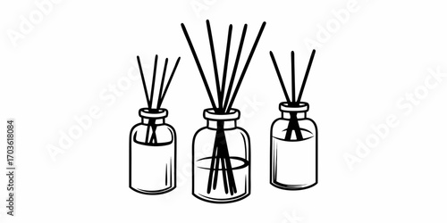 Three reed diffusers in glass bottles with essential oils and sticks for home fragrance and aromatherapy use