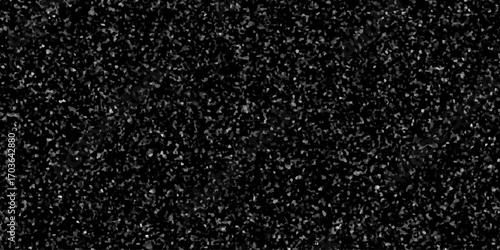Snowfall Bokeh Lights on Black Background, Shot of Flying Snowflakes in the Air. Falling snow isolated on pure black background. Shiny luxury black glitter texture surface background.