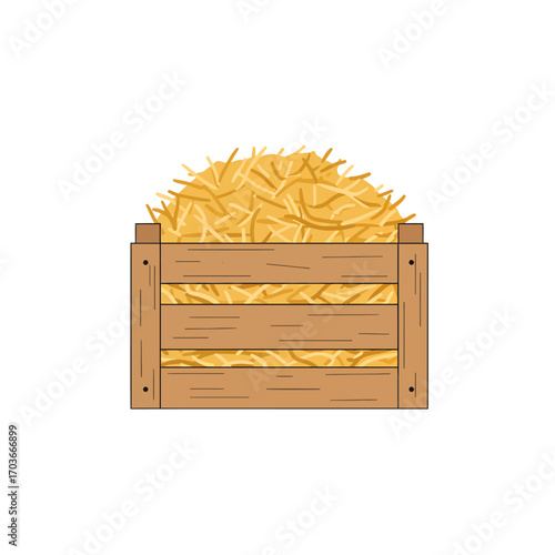 Wooden crate filled with golden hay, a common sight in agricultural settings.