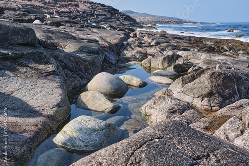 Tundra landscape on the Barents Sea coast on a bright autumn day. Autumn beauty of nature.