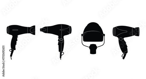 Collection of four black hair dryers arranged in a row on white studio background vector