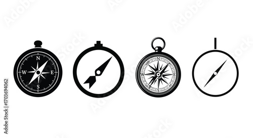 Four vintage compass icons showing directional navigation and exploration concepts vector
