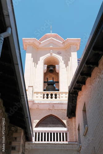 Bell tower of Holy Monastery of the Virgin Mary of Kykkos on sunny day. Cyprus.