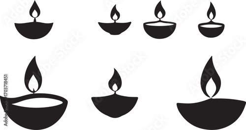 his image displays a collection of seven black silhouetted diya lamps. Each diya, a traditional oil lamp, features a small bowl with a flickering flame rising from its center. 