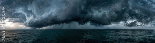 Vast ocean under a dark, stormy sky