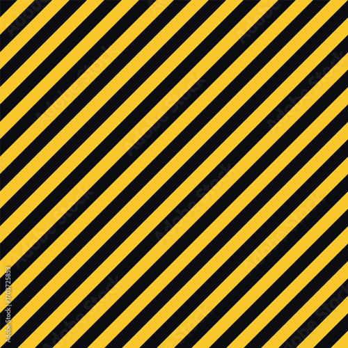 Seamless diagonal stripe pattern in yellow and black colors. Caution hazard warning background for industrial safety design. Abstract geometric striped texture for construction, security prevention