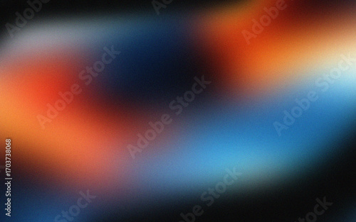 Abstract blurry grainy grunge background  with orange and blue hues dark shadows and subtle texture