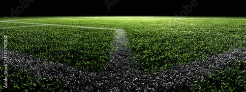 Artificial turf football field at night