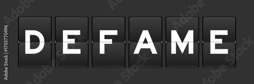 Black color analog flip board with word defame on gray background