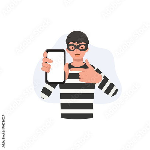 thief in striped shirt holding smartphone presenting smartphone for online fraud cybercrime and digital theft visuals