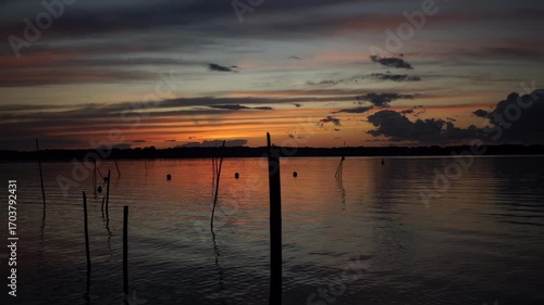 Peaceful sunset over Schwielowsee in Caputh Brandenburg, filmed from the Caputher Gemünde observation platform during twilight.