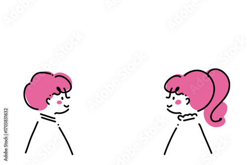 笑顔で向かい合う男の子と女の子　ピンク