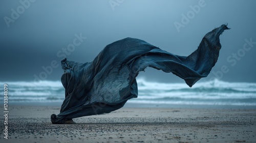 Ephemeral Dance - Fabric in Motion on a Stormy Beach.