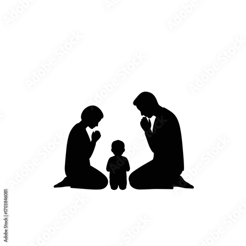 Parents praying with child in silhouette for Thanksgiving concept  