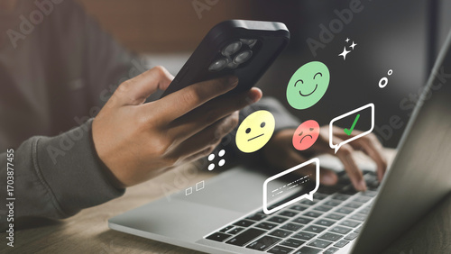 Sentiment analysis and opinion mining concept with emoji faces and digital feedback icons on a laptop and smartphone, representing customer emotions, online review analysis, User experience insights.