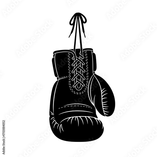 Black boxing glove hanging by laces on white background