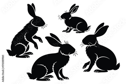 Four black silhouette hares or rabbits in different poses on a white background