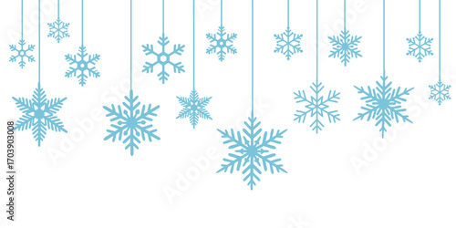 Delicate blue snowflakes suspended from above against a clean white background.