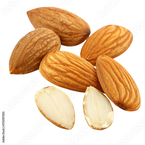 Close-up of shelled almonds some halved showing their texture and creamy interior
