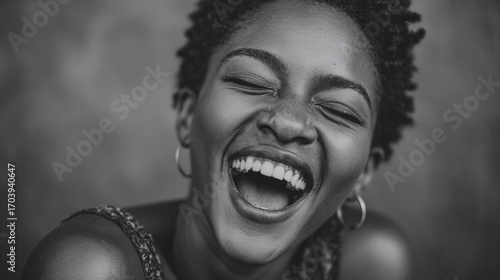 black woman in joyful laughter highlighting radiant smile authentic happiness and vibrant human connection