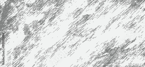 Gray abstract grunge texture over light background features diagonal streaks and splatters, evoking a sense of aged or distressed surface ideal for overlays and design accents
