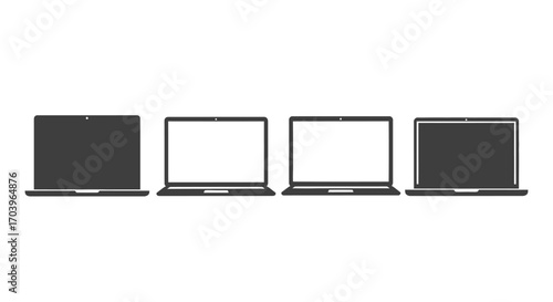 Four sleek laptop computers lined up displaying various screen states and designs vector