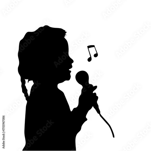 Young Child Singing into Micr...