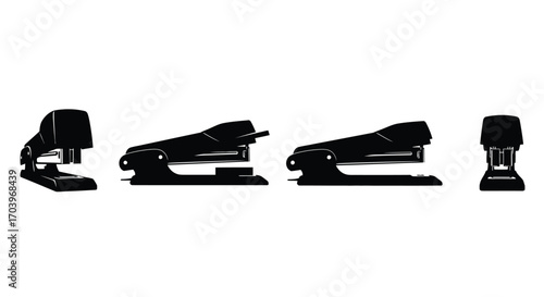 Collection of four black staplers showcasing different designs and sizes for office supplies vector