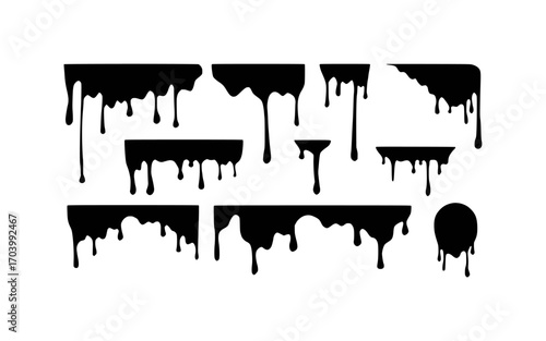 Black Dripping Paint Splatters and Stains on White Background