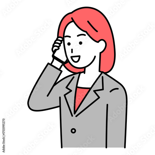 スマートフォンで話すスーツの女性