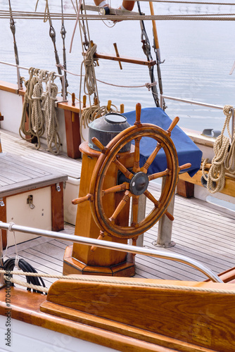 Konstfotografi Helm and rigging details of vintage wooden sailing boat in Helsingborg
