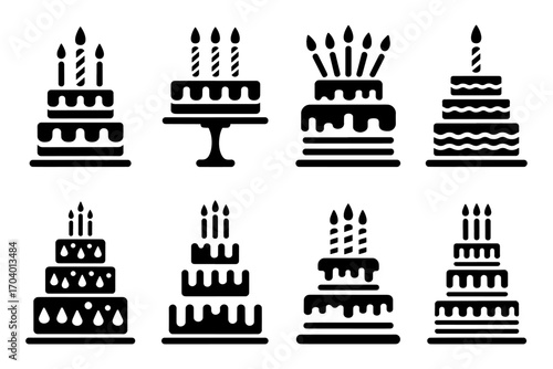 Various elegant and delectable cakes silhouette with lit candles