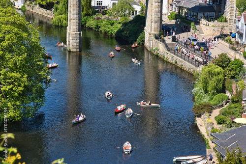 Εκτύπωση καμβά River Scene with Rowboats and Stone Bridge  in Knaresborough, UK.