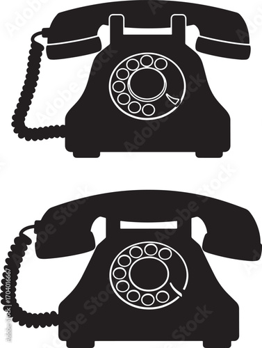 Two vintage rotary dial telephones silhouette