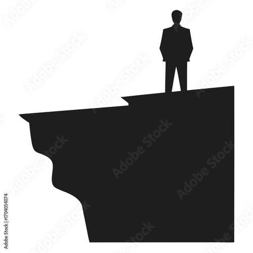Silhouette of a man stands alone on a jagged cliff overlooking the horizon with transparency