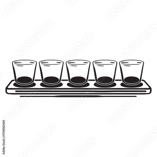A row of five empty shot glasses on a wooden serving tray