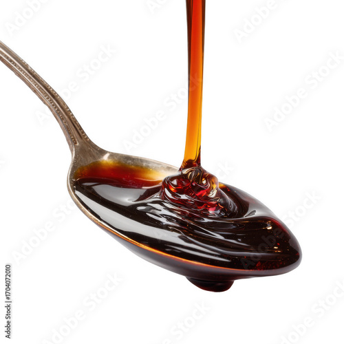Delicious Oyster Sauce Flowing from a Spoon isolated [Transparent Background PNG].