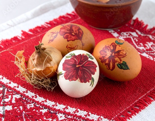 Painted Easter eggs on a red cloth