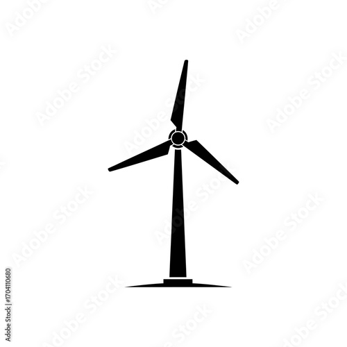 A wind turbine's propeller blade harnesses the power of the wind to generate clean electricity against a blue sky, representing a green alternative in renewable energy technology