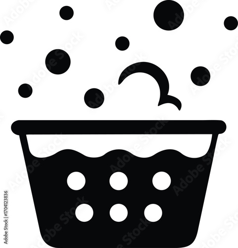 Black and white icon of a wash basin filled with soapy water and bubbles on a white background bucket