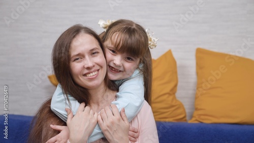 Obraz na plátně Mother, child girl playing together at home