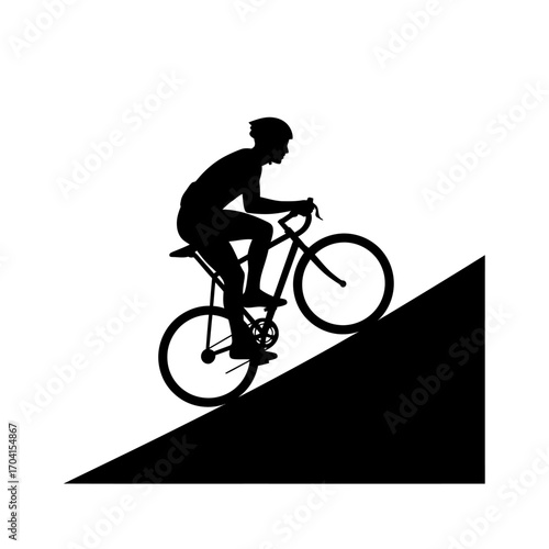 silhouette of a man riding a bike
