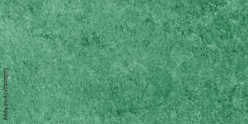 Abstract Elegant dark green background with mottled vintage texture in old fancy background design, texture of colored parchment paper.