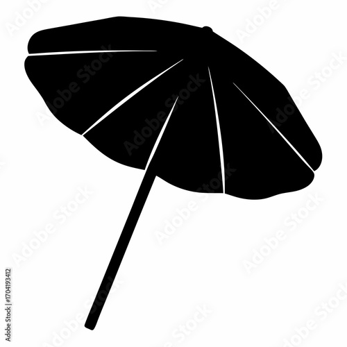 Monochrome beach umbrella providing refreshing shade on a sunny day escape