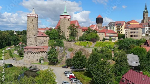The Panorama captures the charm of an old German town Bautzen with colorful houses, imposing church towers, city fortifications, and a harmonious blend of nature and architecture.