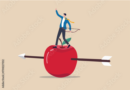 Business goal achievement, risk management or practicing and skill to overcome risky and manage to reach target concept, confidence businessman with archer standing on apple hit by his accurate arrow.